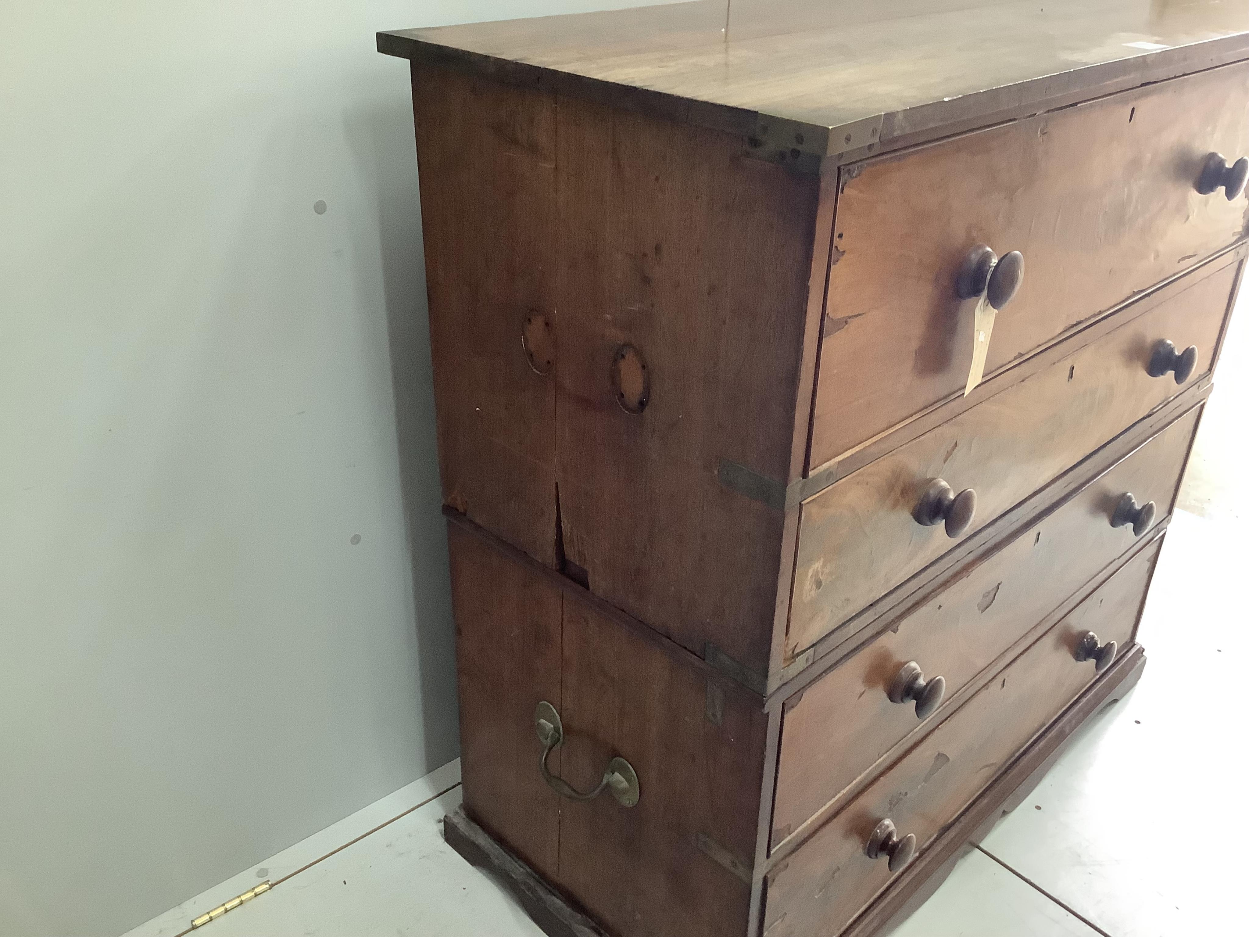 A 19th century hardwood two section military chest, the top drawer fitted as a secretaire, width 114cm, depth 54cm, height 111cm. Condition - poor